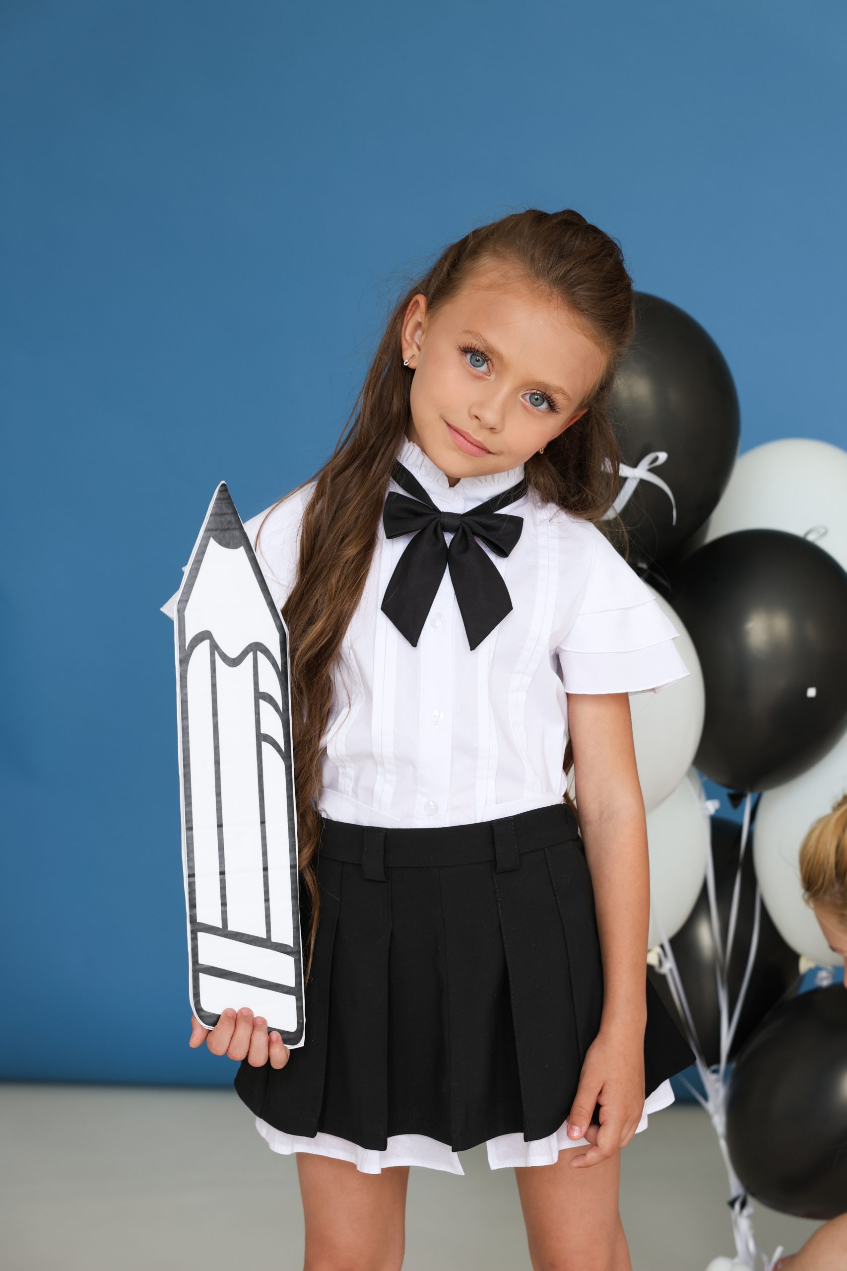 Шкільна блузка для дівчинки TINY LOOK біла з коміром-стійкою та рюшами
