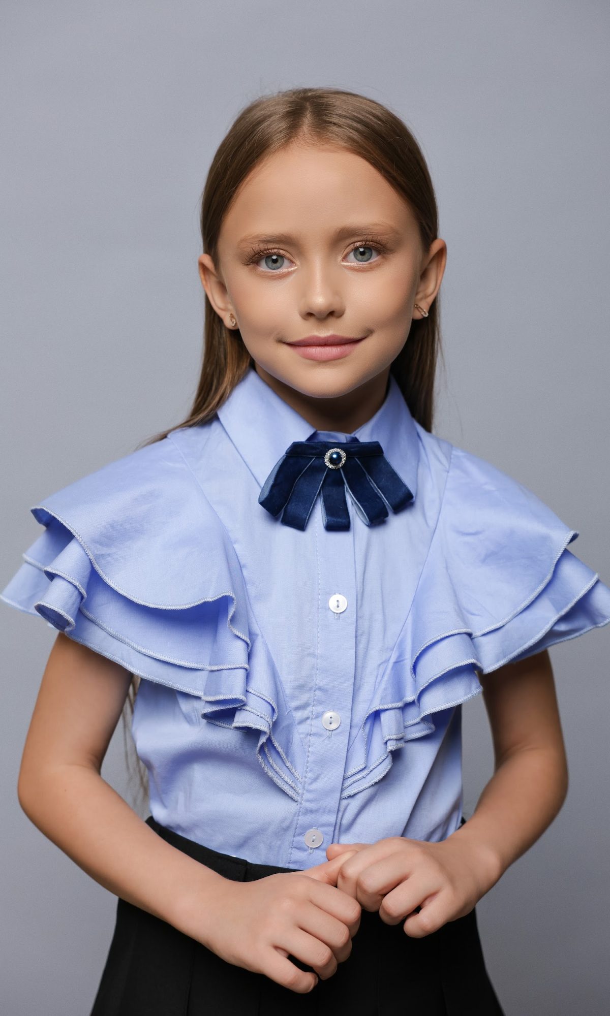 Повітряна блузка для дівчинки TINY LOOK блакитна з каскадними рюшами