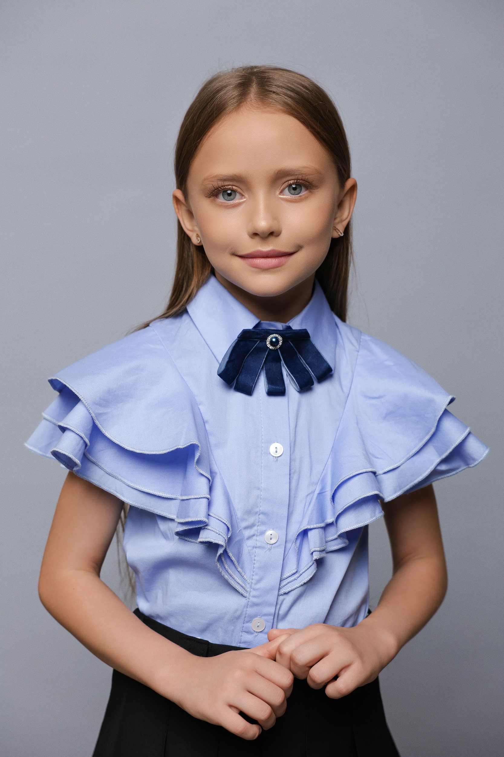 Повітряна блузка для дівчинки TINY LOOK блакитна з каскадними рюшами